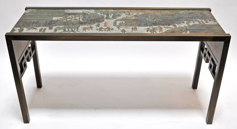 Exceptional console table designed by New York artisans, Philip and Kelvin LaVerne. Features patinated and etched bronze with pewter overlay,  This console is one of the finest examples to come out of the LaVerne studio. Signed.