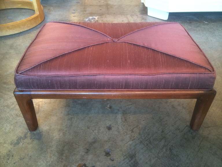 A gorgeous pair of walnut framed stools with silk upholstery. 
Designed by Maurice Bailey for Monteverdi Young.