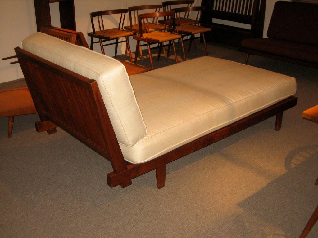 A rare oversized Nakashima daybed. Provenance accompanies. In American black walnut and tussah silk. A great example.