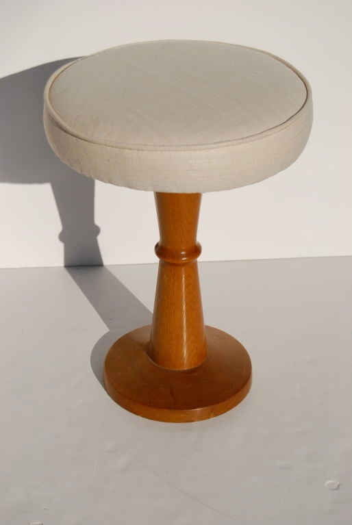 Jean Royère oak stool with silk top adorable. Signed with J. ROYERE brand on the bottom.