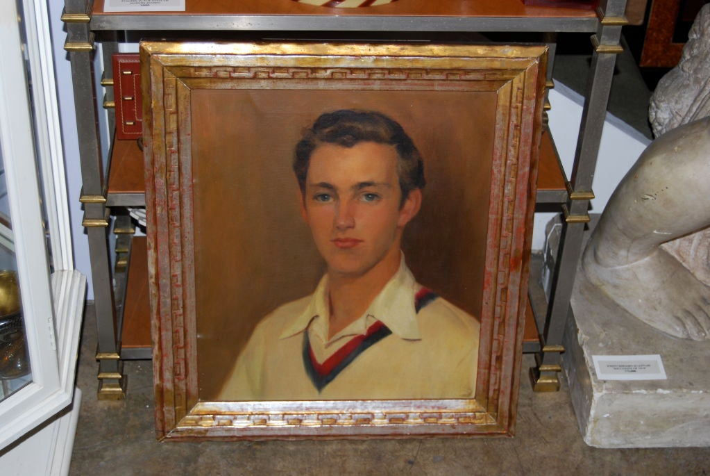 A fantastic portrait of a very handsome young man in a tennis sweater, encased in a handmade gilded frame.



Measures: Image area: 16 x 18.5