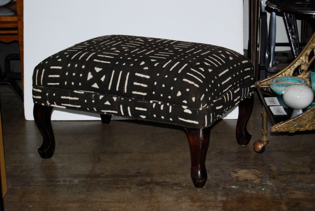 Wormwood Leg Ottoman in African Kuba Cloth