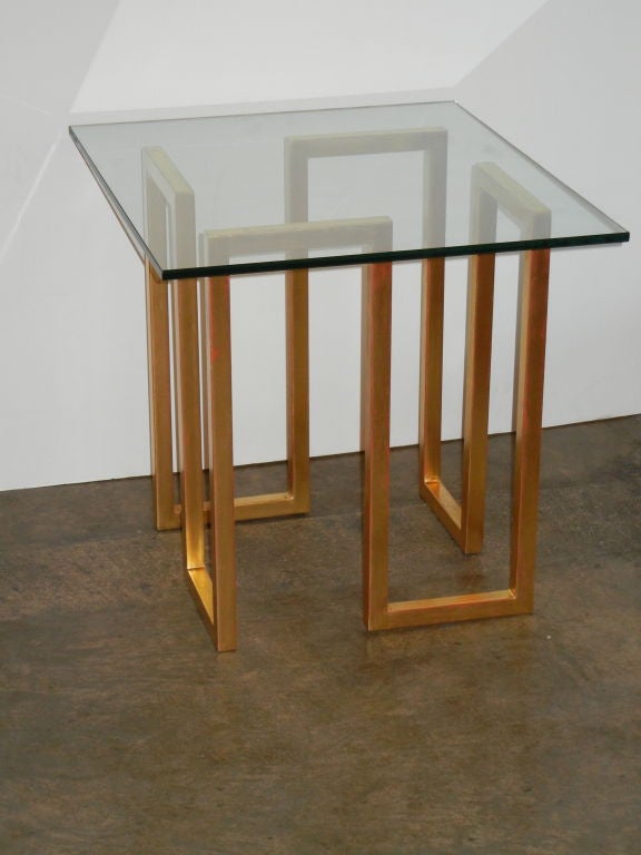 A wonderful occasional table in 22-karat gold gilded metal. From a Beirut commission. Pair of matching side tables also available.