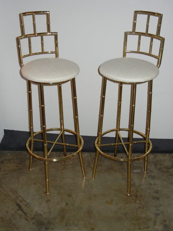 A very glamorous set of barstools; 4 tall backs.
Professionally polished and lacquered with new silk seats. Really striking!