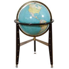 An Ed Wormley for Dunbar Illuminated Globe on Tripod Base.
