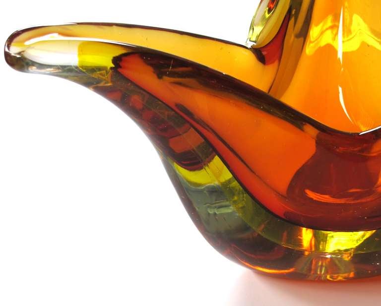 A good quality Murano mid-century gold art glass 3-point bowl; the thickly-modeled bowl of honey-colored glass