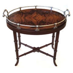 A Richly-Patinated English Crotch Mahogany Oval Tray with Pewter Gallery Raised on a Later Stand