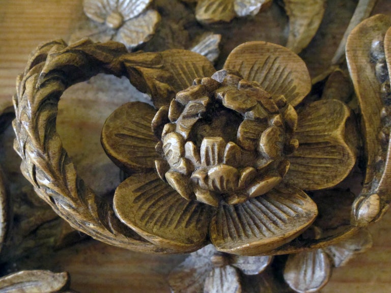 A Carved Pair of English Waxed Pine Architectural Elements Depicting Garlands