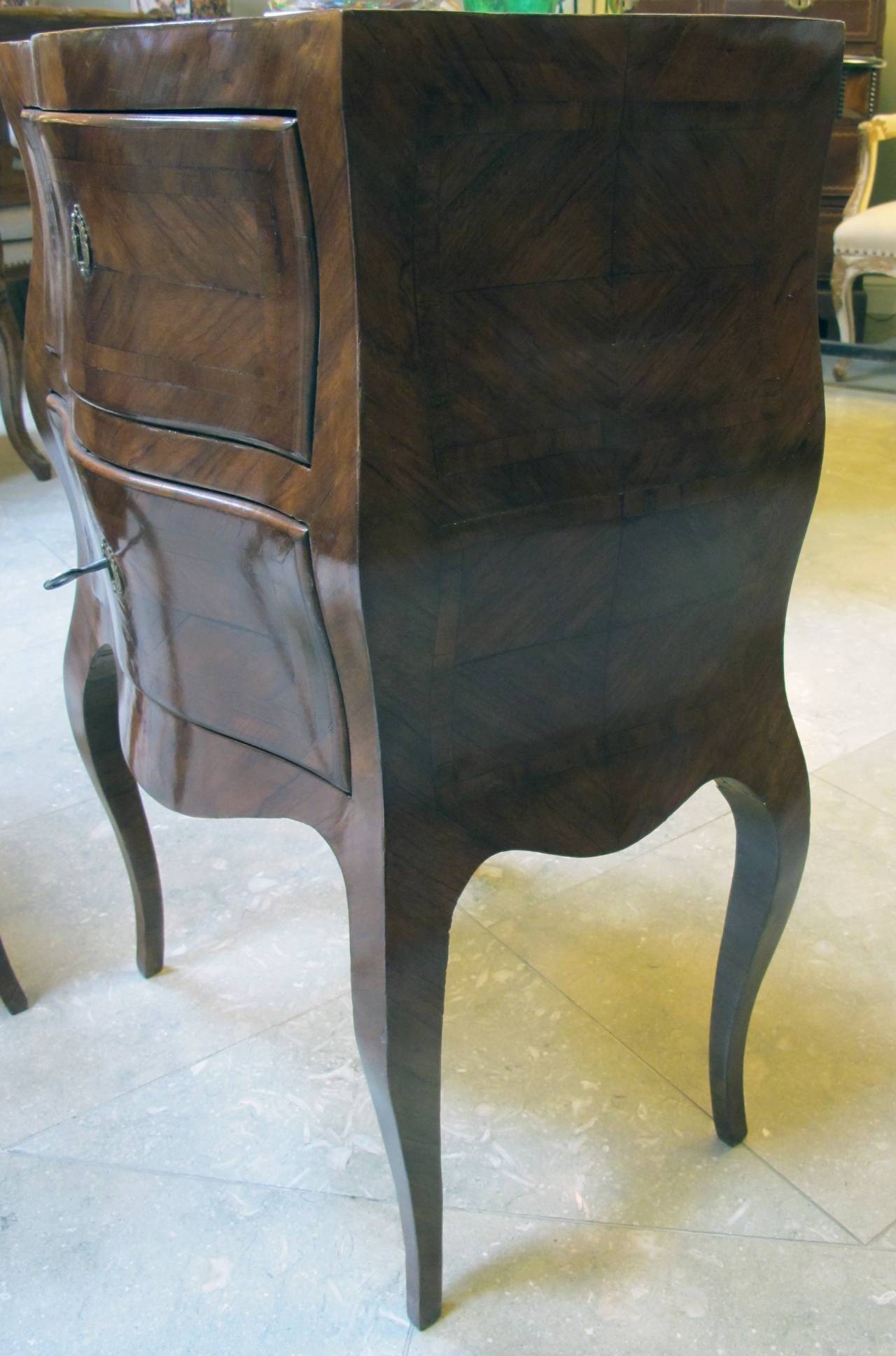 A Shapely Pair of Italian Rococo Style Walnut Bedside Commodes