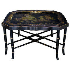 A Shapely and Finely Decorated English Black Tole Tray on Stand with Chinoiserie Decoration