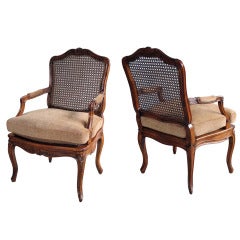 Elegant Pair of French Rococo Beechwood Open Arm Chairs with Caned Seat and Back