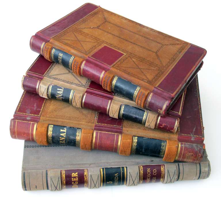 American Unique Set of Four Leather-Bound Accounting Ledgers with Gilt Highlights
