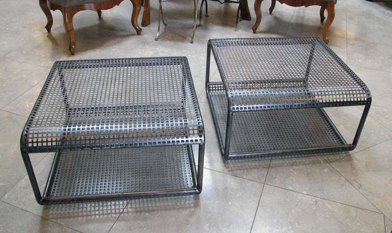 A unique French 1960's industrial steel mesh table or bench; the square table or bench composed of sturdy wrapped pierced metal sheets over a tubular frame