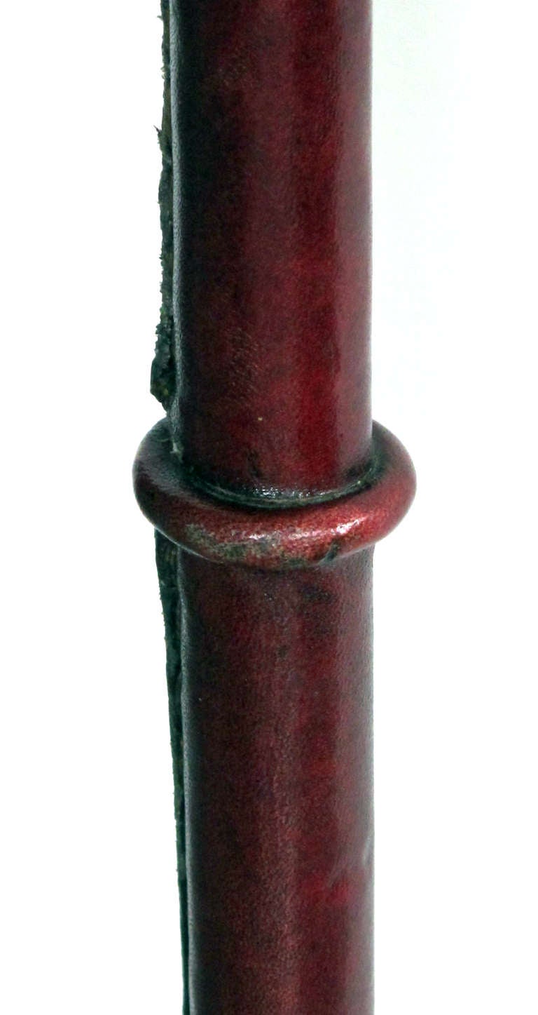 An Important French Maroon Red Leather Floor Lamp; by Jacques Adnet