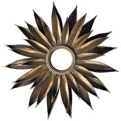 A Large-Scaled and Vibrant French 1940's Gilt-Tole Foliate Starburst Convex Mirror