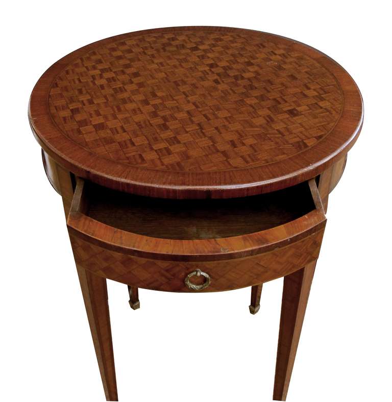 19th Century A Tailored French Louis XVI Style Tulip and Kingwood-Veneered Circular Single-Drawer Side Table