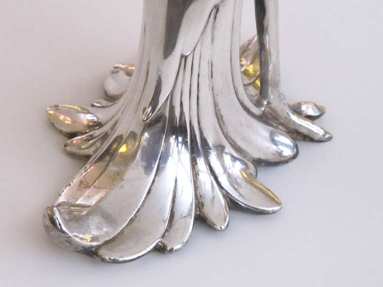 Mid-20th Century An Elegant and Stylized Pair of American Art Deco Silver-Plated Peacocks by Weidlich Brothers