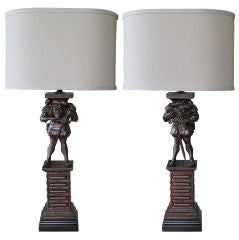 Pair of French Renaissance Revival Carved Walnut Pedestals Mounted as Lamps