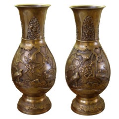 A Finely-Detailed Pair of Japanese Brass Vases with Birds and Foliate Motifs