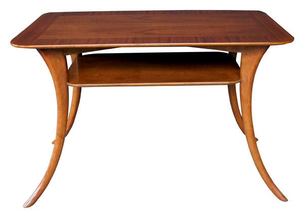 A stylish American mid-century rectangular walnut side table; maker's label 