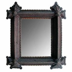 Antique A Deeply Patinated French Art Populaire Chipped-Carved Mirror