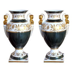 An Elegant Pair of French Empire Style Forest-Green and Parcel-Gilt Pyriform Double-Handled Urns