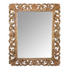 A Well-Carved Italian Baroque Style Reticulated Giltwood Mirror