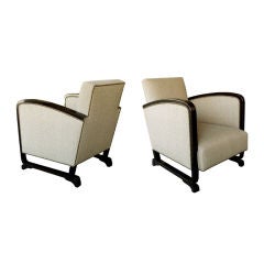 A Sleek Pair of French Art Deco Stained Beechwood Club Chairs