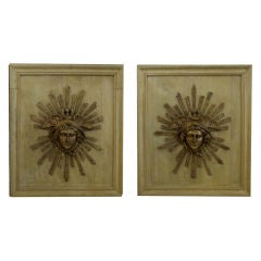 A Unique Pair of French Louis XVI Gilt-Metal Medallions Depicting Mercury now Mounted on Oak Panels