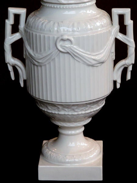 An Elegant Pair of German KPM Blanc de Chine Porcelain Urns