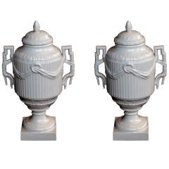 An Elegant Pair of German KPM Blanc de Chine Porcelain Urns