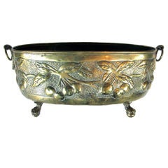 A Well-Detailed Dutch Hand-Hammered Repousse Brass Double-Handled Jardiniere