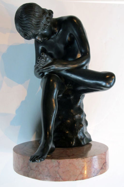 A good and large-scaled Italian grand tour bronze of Spinario (boy with thorn); a well-rendered bronze sculpture of a seated boy withdrawing a thorn from the sole of his foot all over a pink marble base (original in the Plazzo dei Conservatori, Rome)