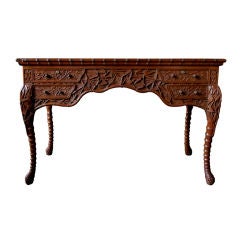 A RareChinese Export 4-Drawer  Carved Teak Writing Desk with Carved Bamboo Decoration
