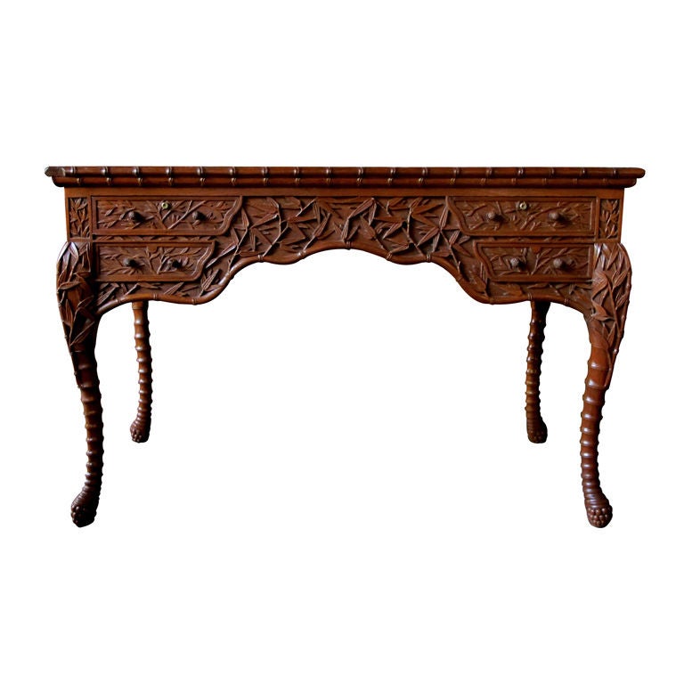 A Rarechinese Export 4 Drawer Carved Teak Writing Desk With A Rarechinese Export 4 Drawer Carved Teak Writing Desk With Bamboo Decoration For