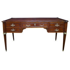 A French Louis XVI Style Mahogany Writing Desk with Ormolu Mounts