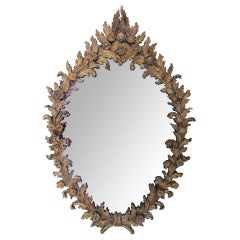 A Curvaceous Italian Rococo Style Floral & Foliate Carved Mirror