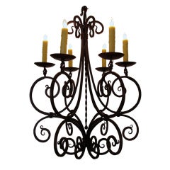 A Gracefully Shaped French Hand-Wrought Iron 6-Light Chandelier