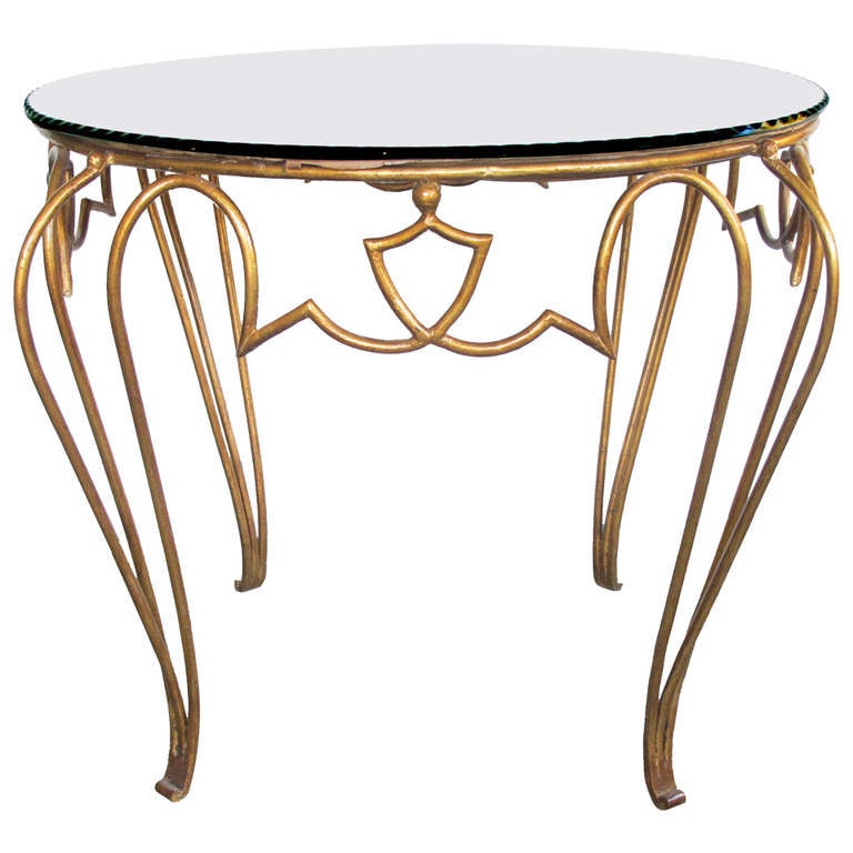 A Chic French Art Deco Gilt-Iron Circular Table with Mirrored Top by Rene Drouet