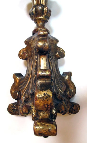 18th Century and Earlier A Boldly-Scaled Italian Baroque Carved Giltwood Candlestick For Sale