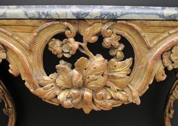 Régence A Finely Carved French Regence Giltwood Console with Marble Top