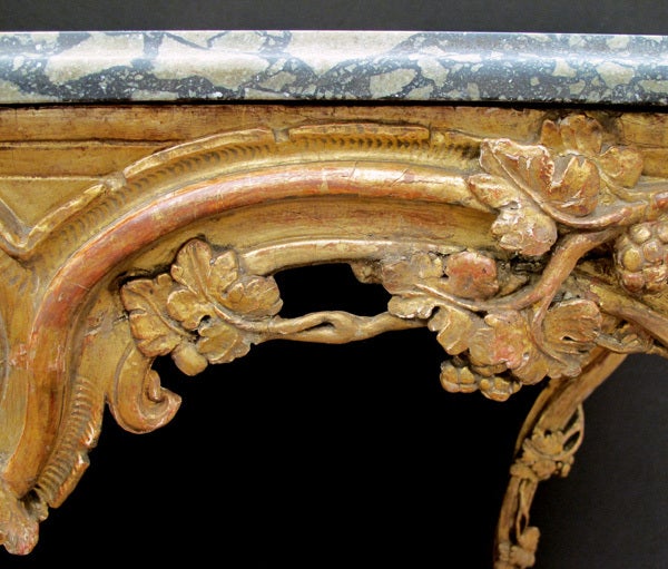 Early 18th Century A Finely Carved French Regence Giltwood Console with Marble Top