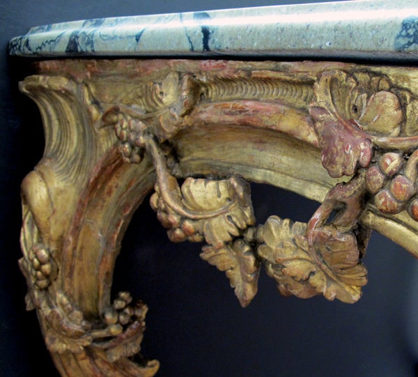 A Finely Carved French Regence Giltwood Console with Marble Top 1
