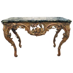A Finely Carved French Regence Giltwood Console with Marble Top