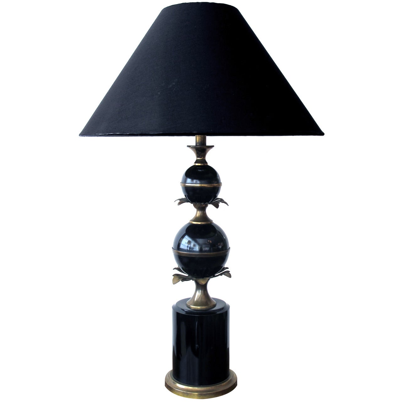 A Stylish French 1940s Black Tole Lamp with Brass Foliate Mounts