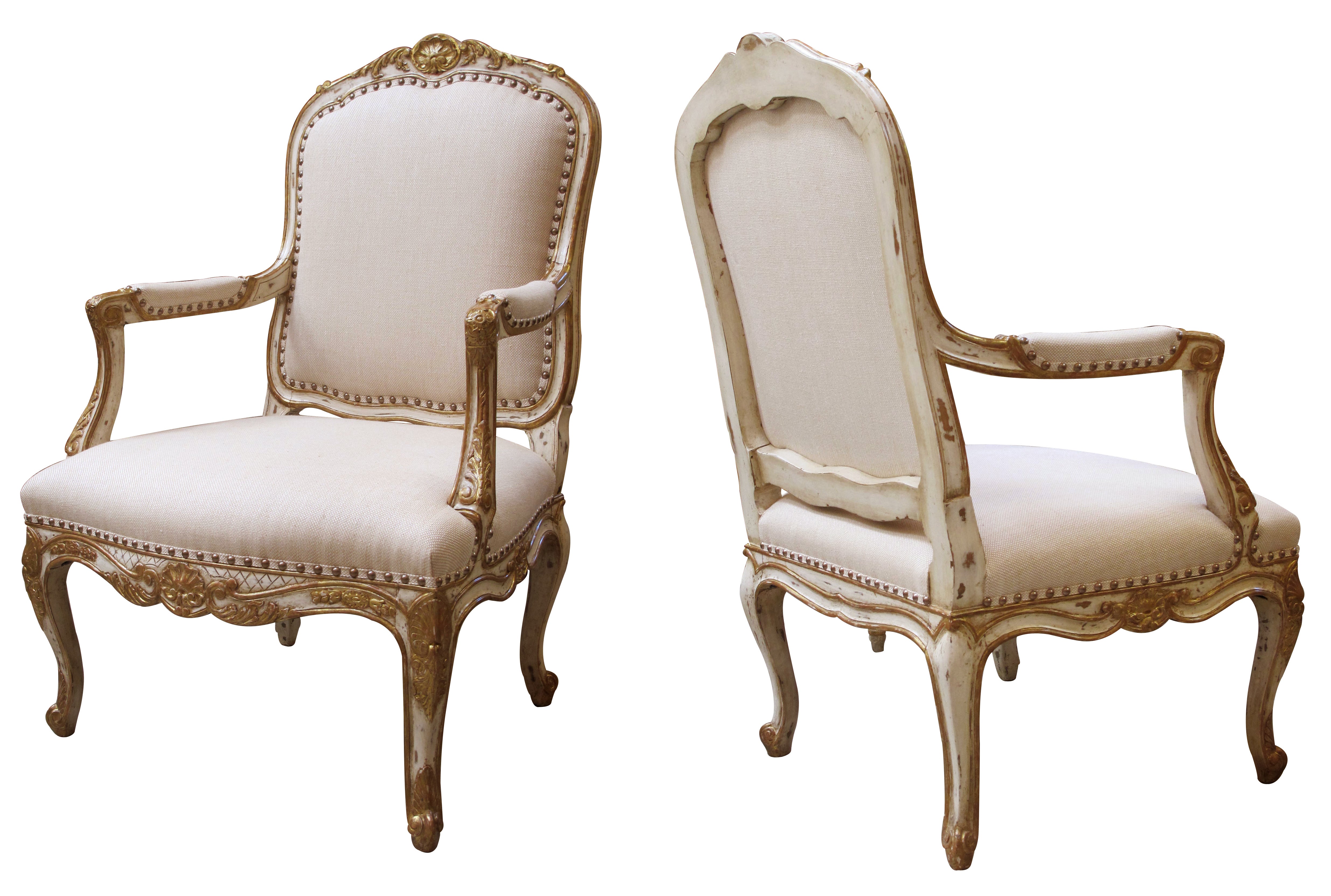 A Handsome Pair of French Louis XV Style Ivory Painted & Parcel-Gilt Arm Chairs