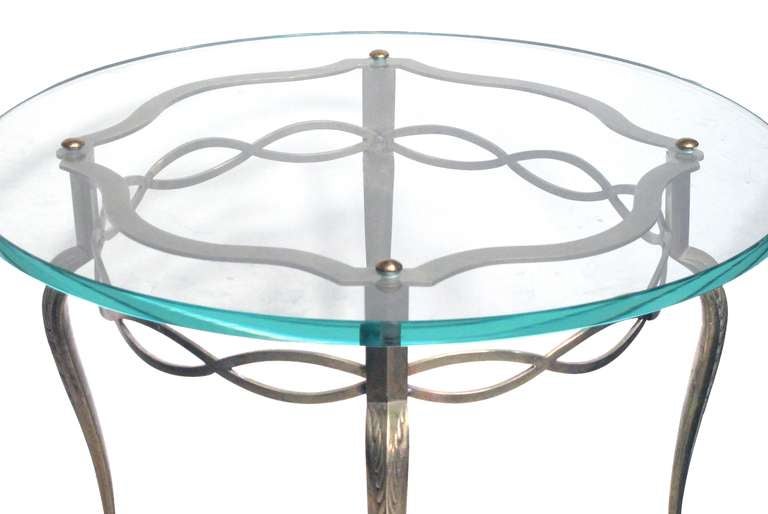 A Graceful French Mid-Century Circular Brass Side Table with Glass Top In Excellent Condition In San Francisco, CA