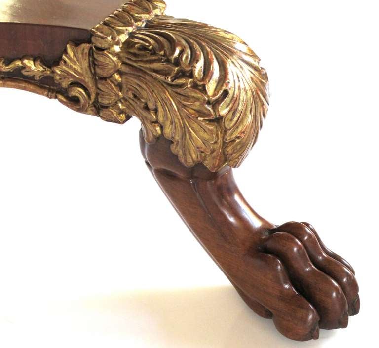 A Good Danish Empire Walnut & Parcel-Gilt Oval Quadruped Center Table