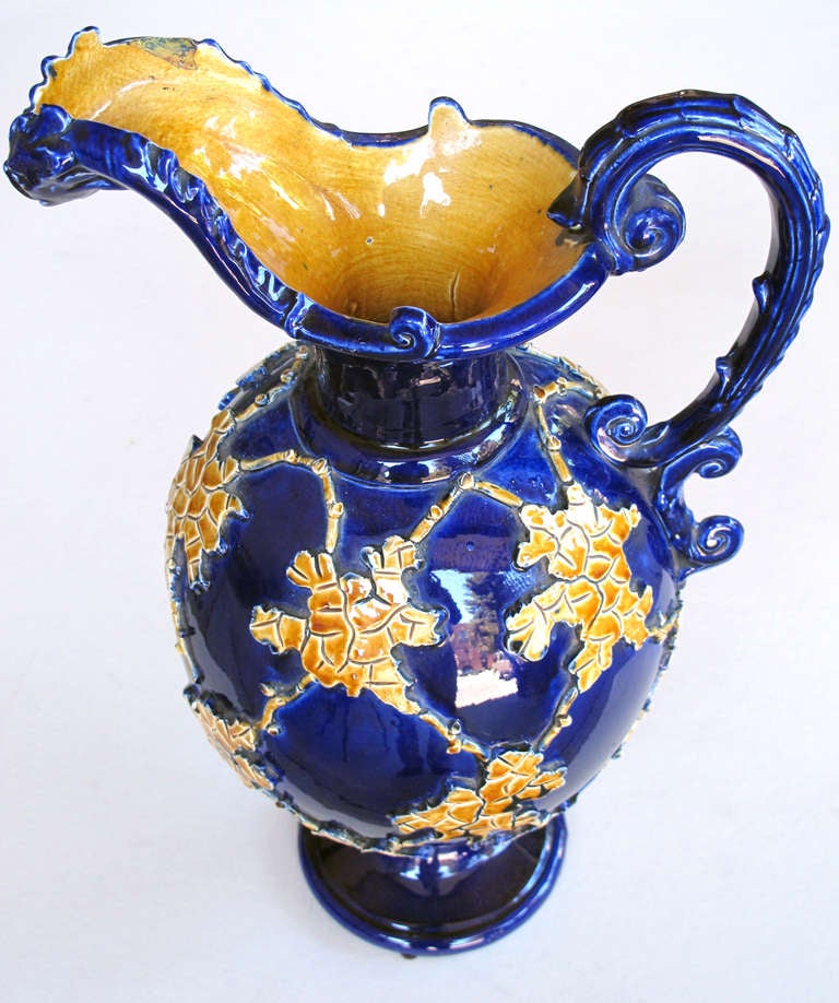 Pair of Italian Cobalt Glazed Majolica Ewers with Raised Decoration In Excellent Condition In San Francisco, CA