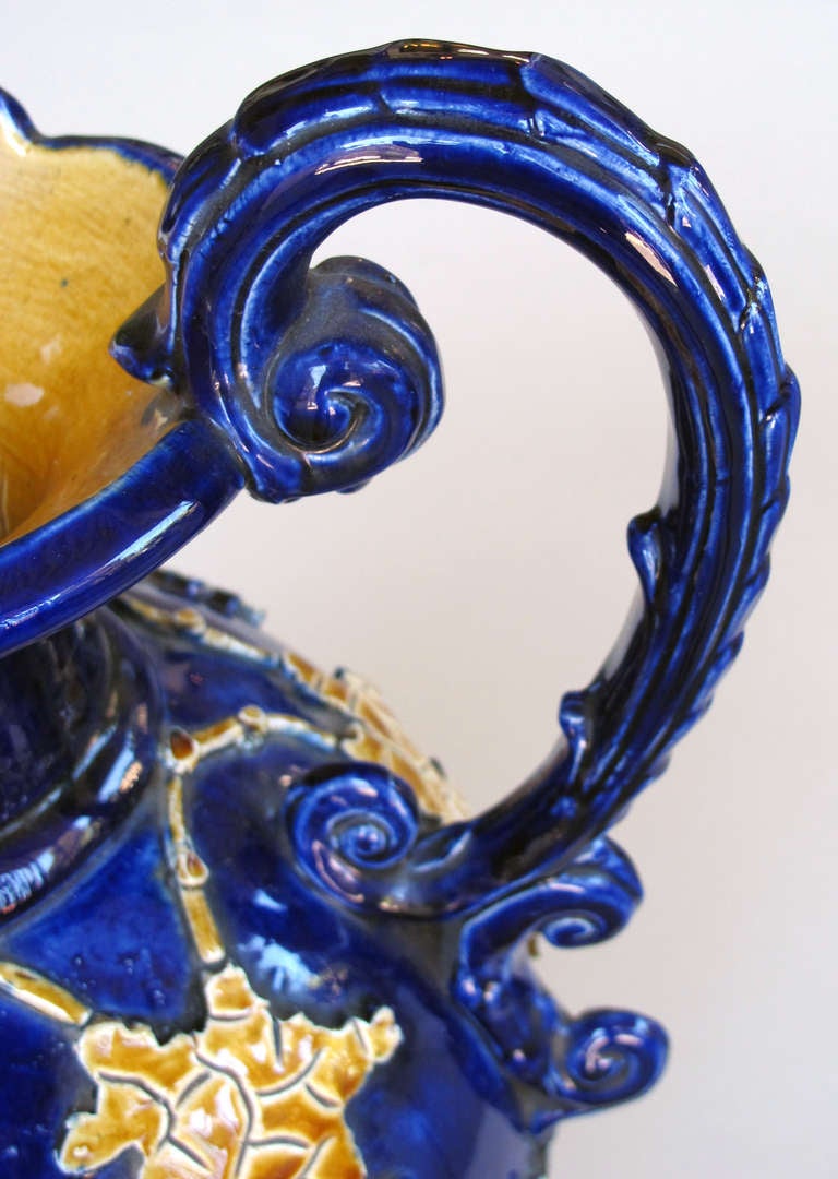 Pair of Italian Cobalt Glazed Majolica Ewers with Raised Decoration 2